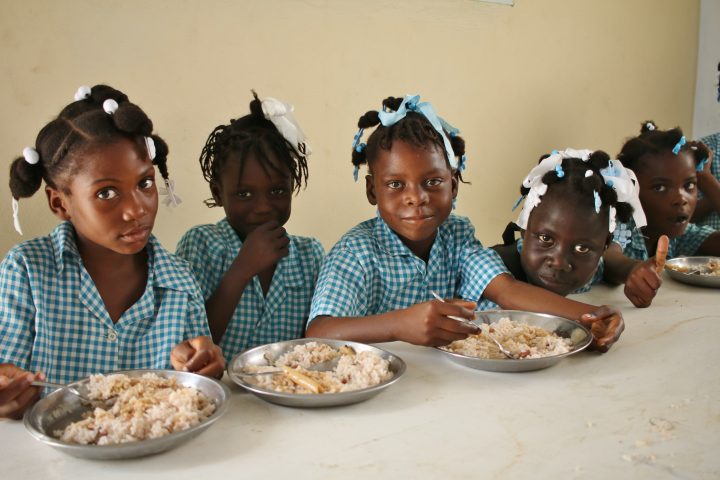 Students eating lunch at the school in Terre Blanche.